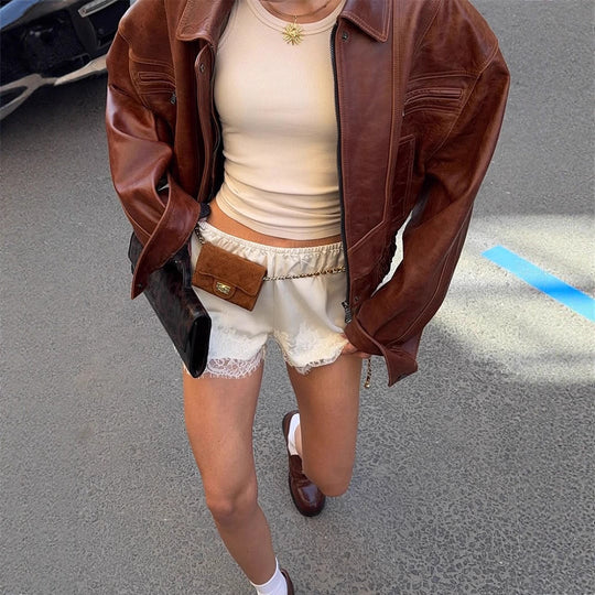 Damen Oversize-Lederimitatjacke im Bikerstil mit Hemdkragen und Reißverschluss Nord Taschen