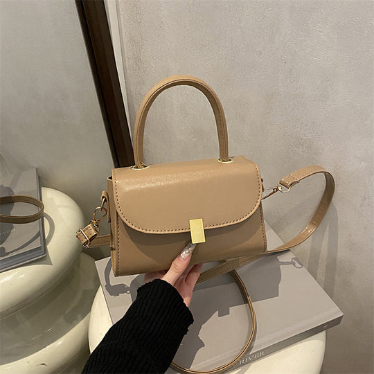 Damen-Handtasche mit abnehmbarem Schulterriemen und eleganter Verschlussmechanik Nord Taschen