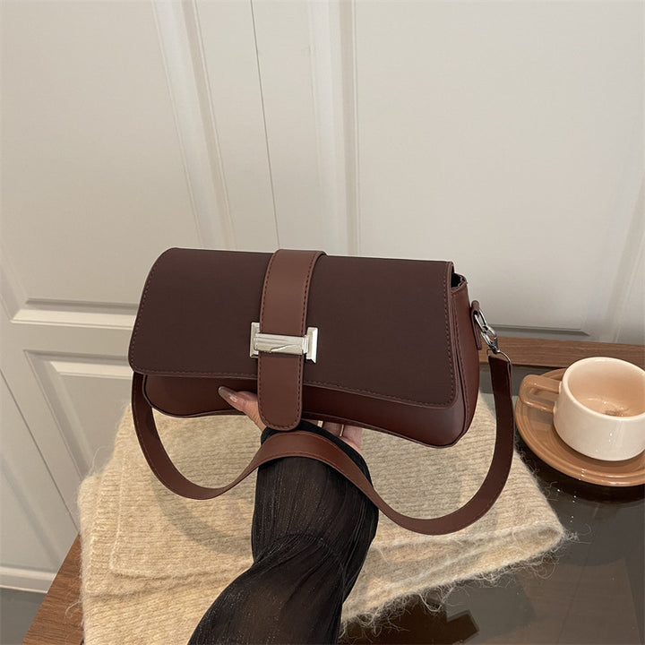 Damen elegante Umhängetasche mit hochwertiger Lederoberfläche und stilvollem Verschluss Nord Taschen