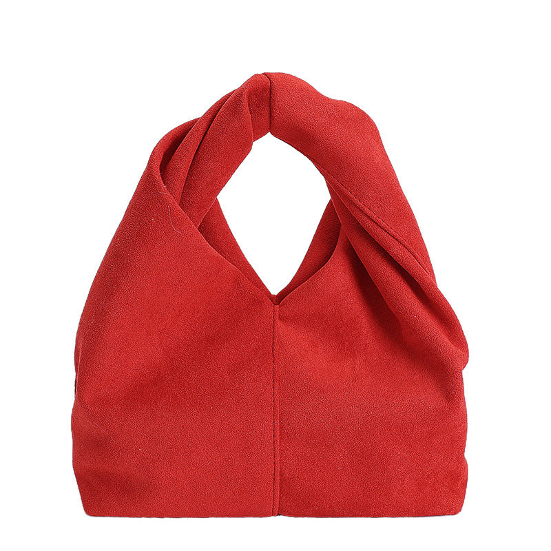Damen Schultertasche aus weichem Veloursleder mit modernem Knotenakzent Nord Taschen