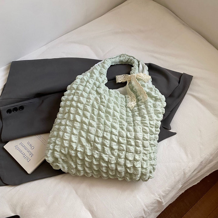 Damen Einkaufstasche mit strukturiertem Design und dekorativem Schleifenakzent Nord Taschen