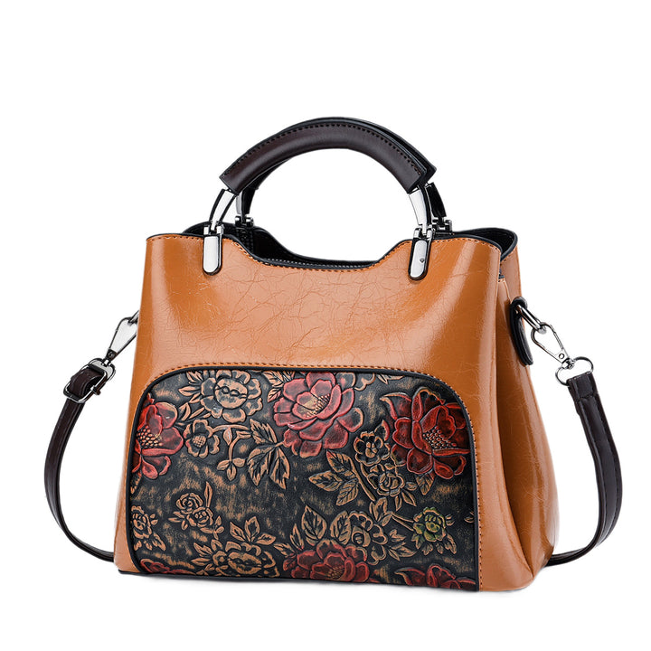 Damen elegante Handtasche mit floralem Relief Nord Taschen