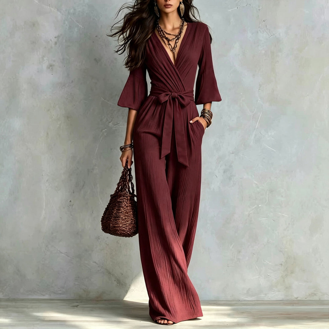 Damen Jumpsuit Wickel-Optik mit weitem Bein, Taillengürtel und Glockenärmeln Nord Taschen