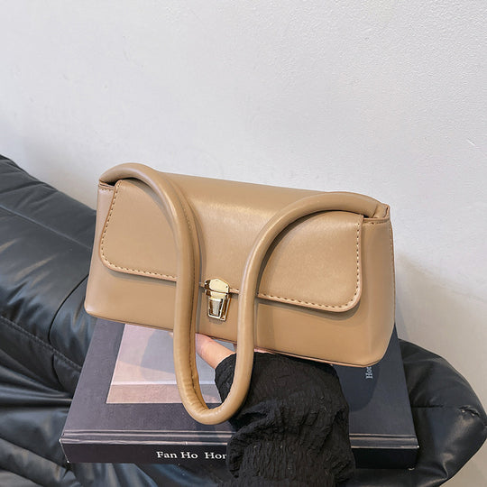 Damen elegante Handtasche mit geschwungenem Henkel Nord Taschen