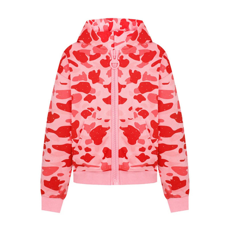 Damen Kapuzenjacke im Camouflage‑Print mit durchgehendem Reißverschluss, Kängurutasche und Rippbündchen Nord Taschen