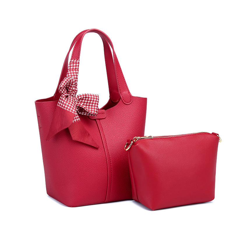 Damen Shopper-Tasche mit eleganter Schleifenverzierung und praktischem Innenlayout Nord Taschen