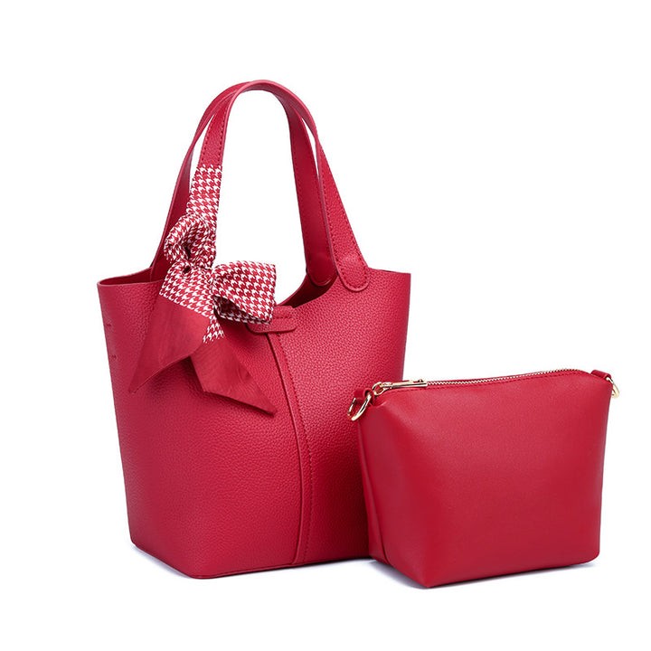 Damen Shopper-Tasche mit eleganter Schleifenverzierung und praktischem Innenlayout Nord Taschen