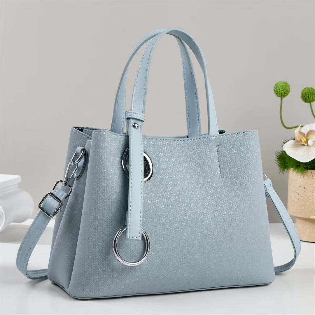 Damen Handtasche mit strukturiertem Design und eleganten Ringdetails Nord Taschen