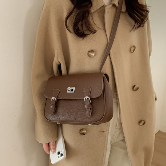 Damen elegante Umhängetasche aus strukturiertem Kunstleder mit praktischen Schnallen Nord Taschen