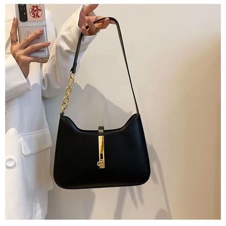 Damen Schultertasche mit goldfarbener Schnallenakzent und vielseitigem Design Nord Taschen