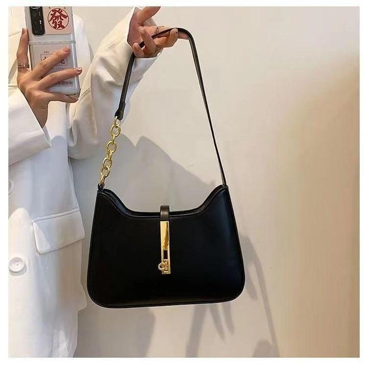 Damen Schultertasche mit goldfarbener Schnallenakzent und vielseitigem Design Nord Taschen