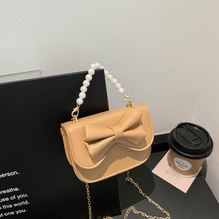Damen Handtasche mit elegantem Schleifendetail und Perlenhenkel Nord Taschen