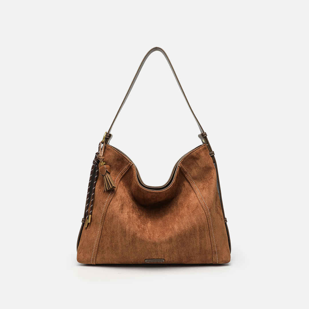 Damen Hobo Tasche mit elegantem Leder und dekorativen Quasten Nord Taschen