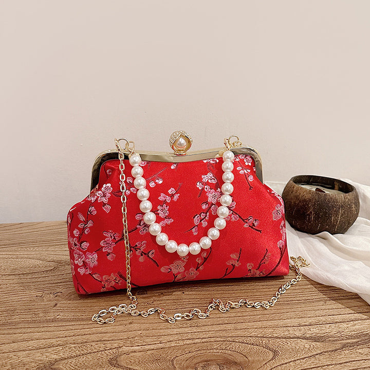 Damen elegante Clutch mit floralen Akzenten Nord Taschen