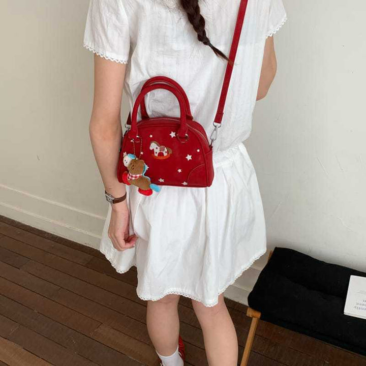 Damenhandtasche mit tierischem Motiv und dekorativen Sternen Nord Taschen