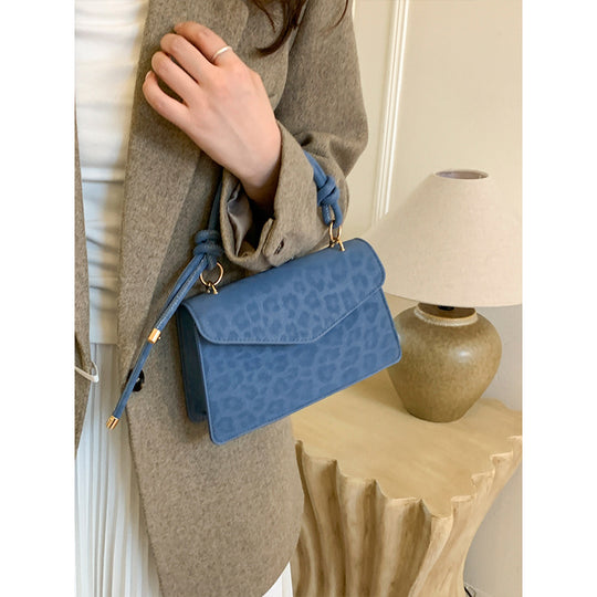Damen Umhängetasche mit eleganter Leo-Prägung und abnehmbarem Schulterriemen Nord Taschen