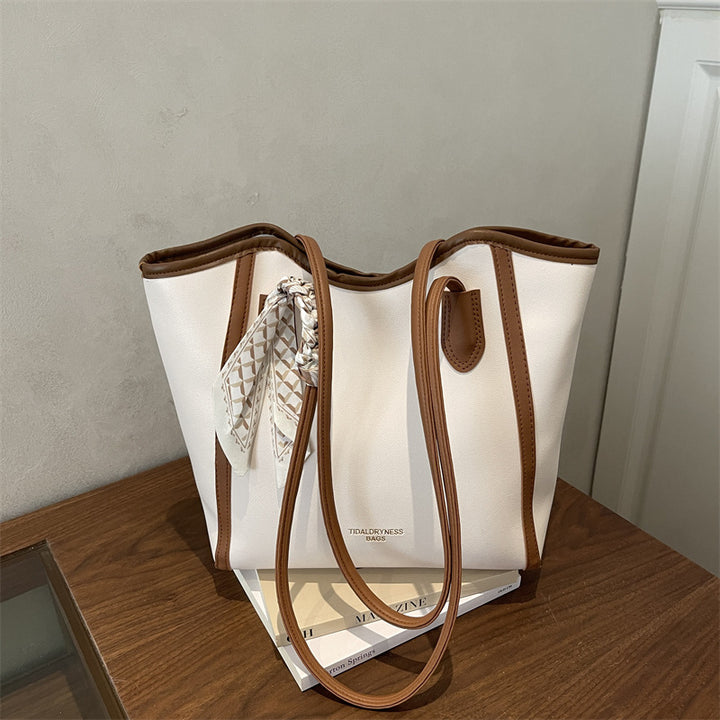 Damen elegante Handtasche mit modischem Schalszierring Nord Taschen