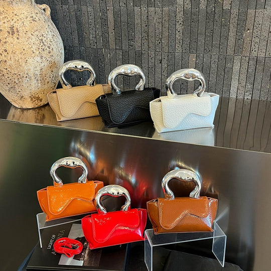 Damenhandtasche mit modernem Griff Nord Taschen