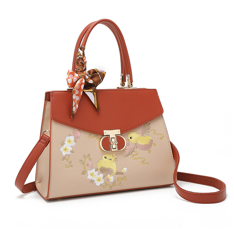 Damen Handtasche mit floraler Stickerei und modischem Schal Nord Taschen