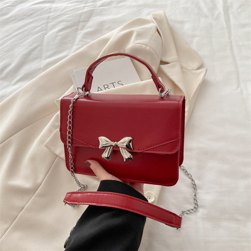 Damen elegante Handtasche mit verspieltem Schleifenakzent Nord Taschen