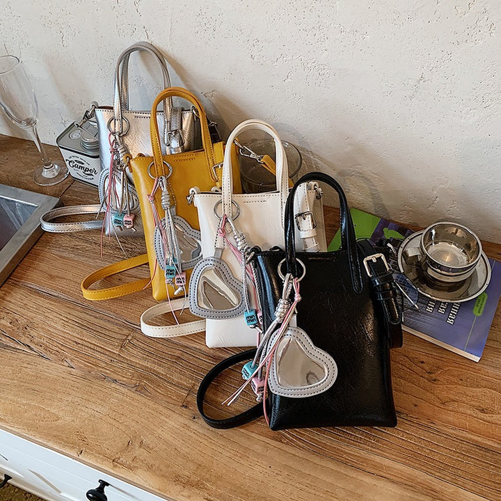Damen Mini-Handtasche mit elegantem Anhänger Nord Taschen