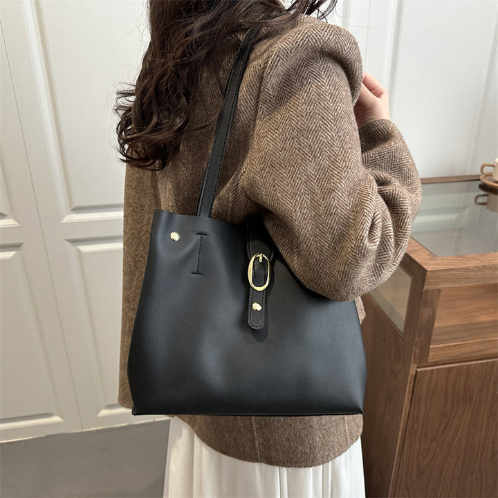 Damen elegante Handtasche mit goldenen Akzenten Nord Taschen
