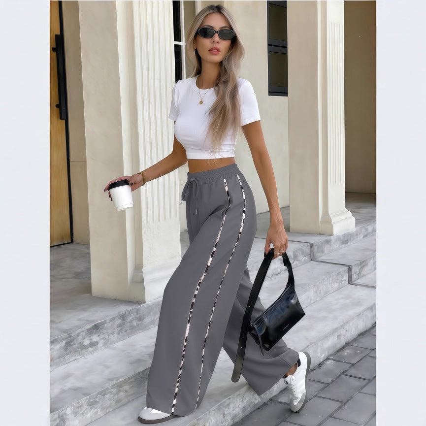Damen Weite High‑Waist Loungehose mit Kordelzug und kontrastierenden Seitenstreifen Nord Taschen