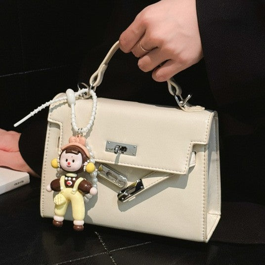 Damen Mini Handtasche mit süßem Anhänger Nord Taschen