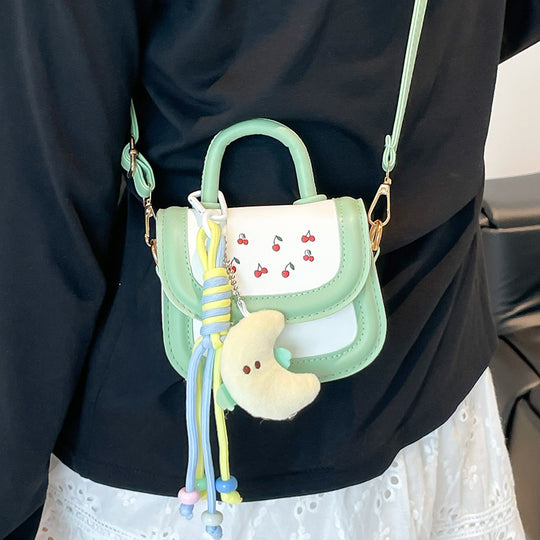 Damen Mini-Handtasche mit fröhlichem Kirschdesign und charmanten Anhängern Nord Taschen