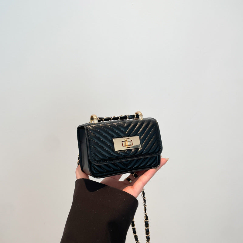 Damen Mini-Handtasche mit gestepptem Design und goldenem Verschluss Nord Taschen