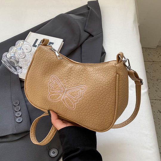 Damen Designer Handtasche mit ausgefallenem Schmetterlingsmotiv Nord Taschen