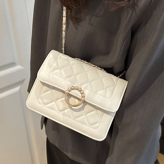 Damen elegante Umhängetasche mit strukturiertem Obermaterial und goldener Verzierung Nord Taschen