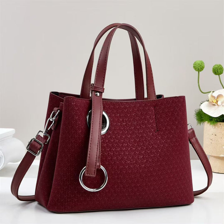Damen Handtasche mit strukturiertem Design und eleganten Ringdetails Nord Taschen