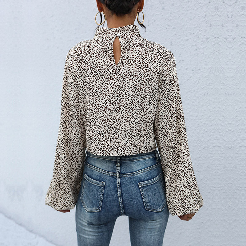 Damen Kurzgeschnittene Twist‑Bluse mit Stehkragen, Knotenfront und Allover Animalprint Nord Taschen