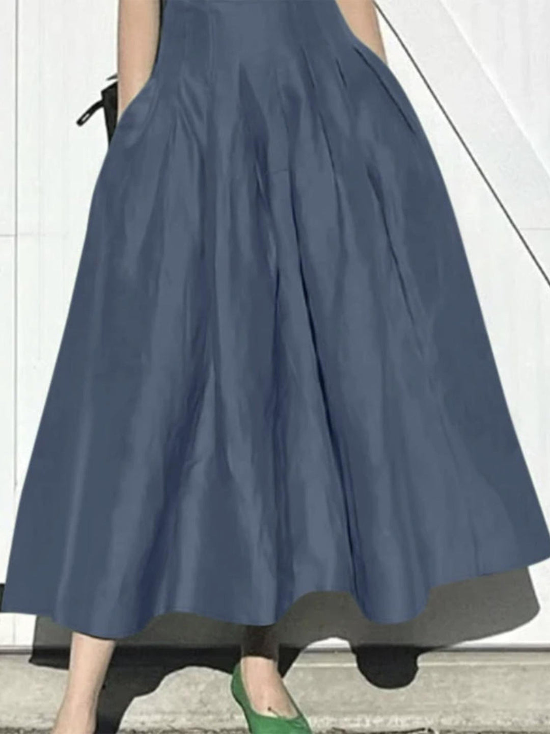 Damen Eleganter Midirock mit fließendem Schnitt und seitlichen Taschen