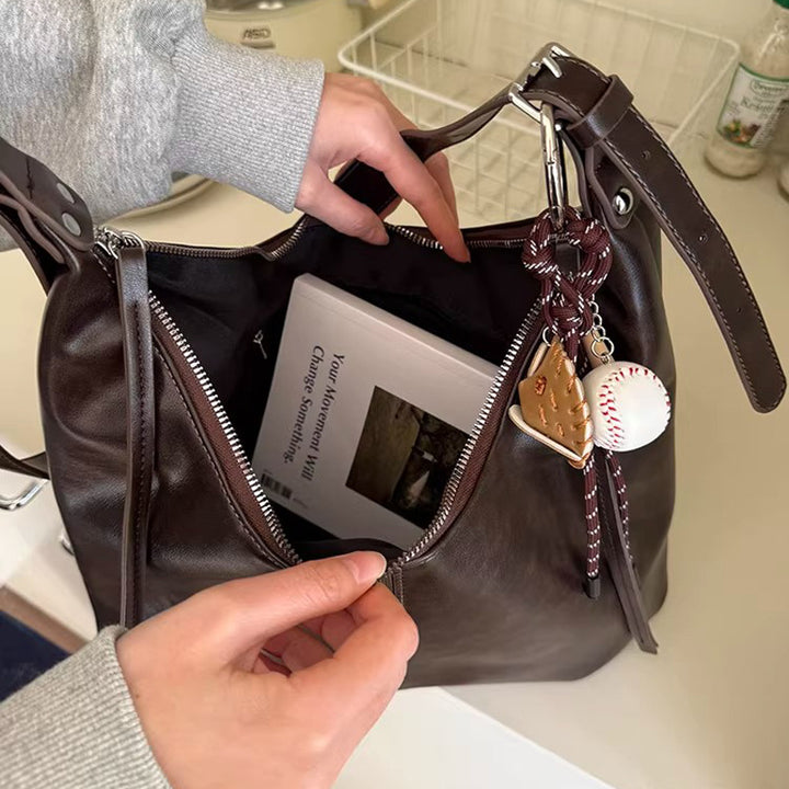 Damen Hobo-Tasche aus geschmeidigem Kunstleder mit flexiblem Tragegriff Nord Taschen