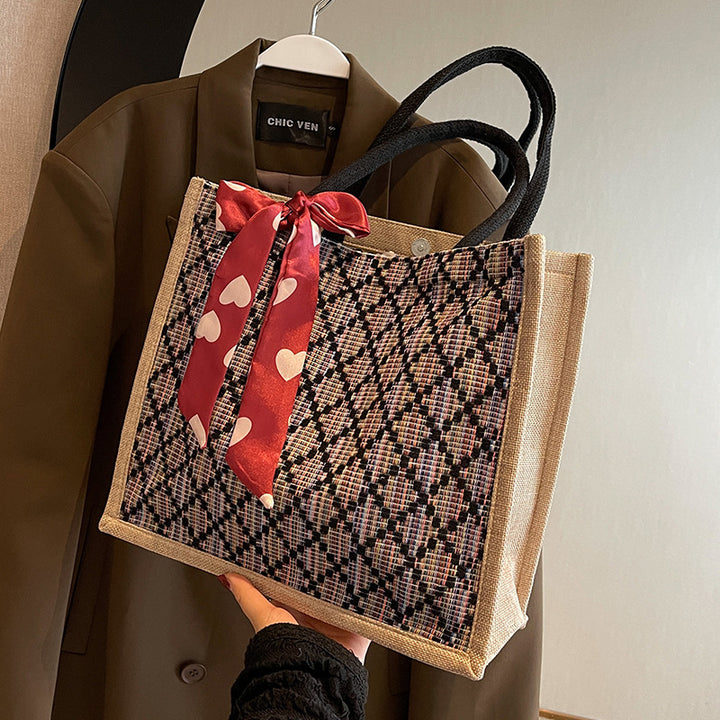 Damen Jute-Einkaufstasche mit buntem Grafikdesign und dekorativem Schleifenakzent Nord Taschen
