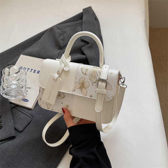 Damen elegante Umhängetasche mit floralem Design und modischen Akzenten Nord Taschen