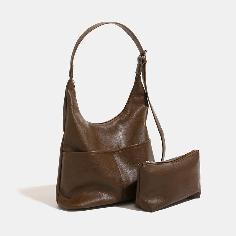 Damen Hobo-Tasche mit geschmeidigem Kunstleder und vielseitigem Innenlayout Nord Taschen