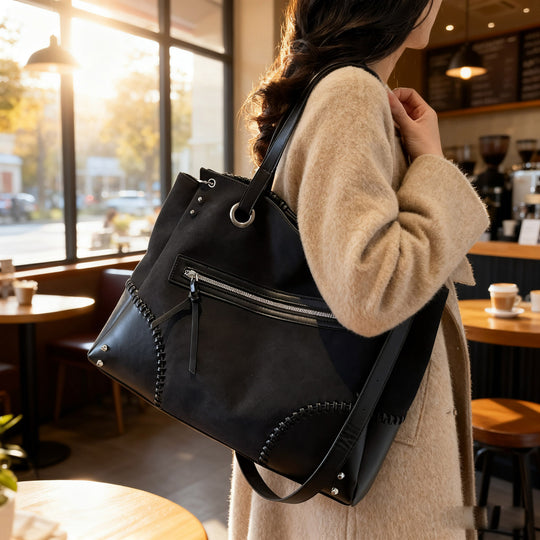Damen elegante Handtasche mit offenen Seiten und dezenten Lederdetails Nord Taschen