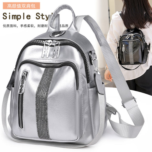 Damen Mini-Rucksack mit stylischen Reißverschlusstaschen und dekorativem Anhänger Nord Taschen