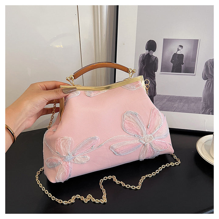 Damen Handtasche mit floralem Muster und elegantem Kettenakkzent Nord Taschen
