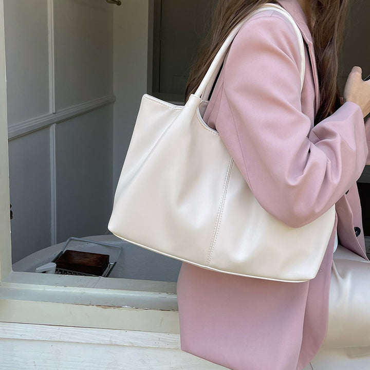 Damen Tragetasche mit minimalistischer Silhouette und elegantem Kunstleder Nord Taschen