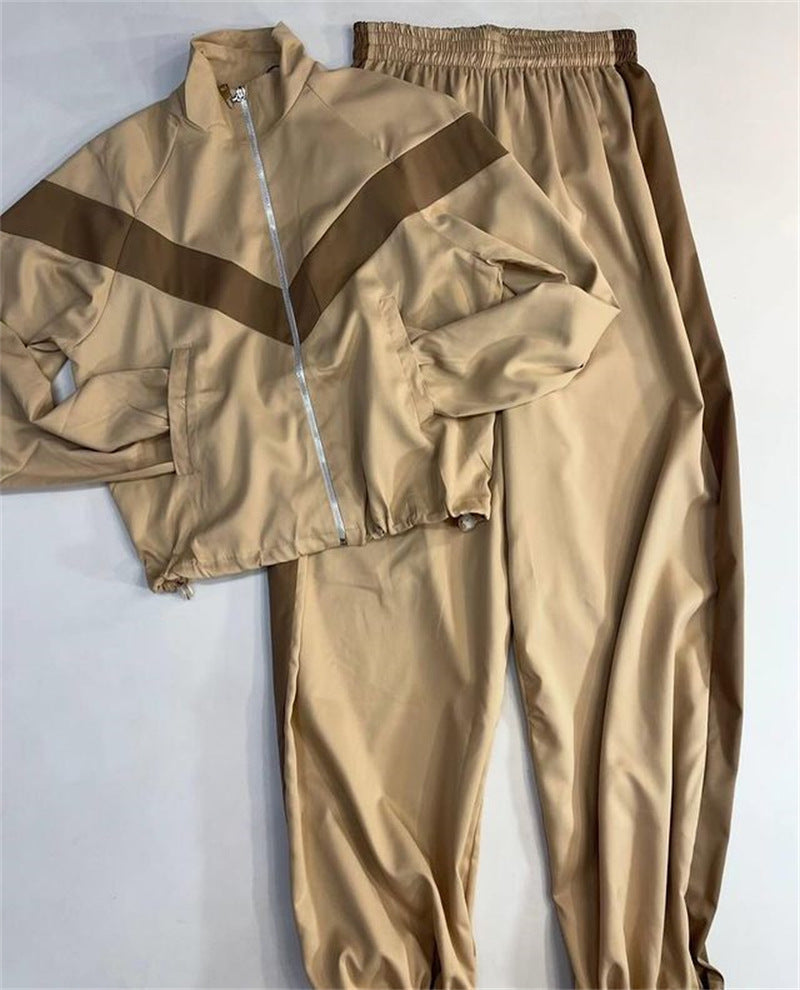 Damen eleganter sportlicher Zweiteiler Trainingsanzug mit Reißverschluss und kontrastierender V-Passe Nord Taschen