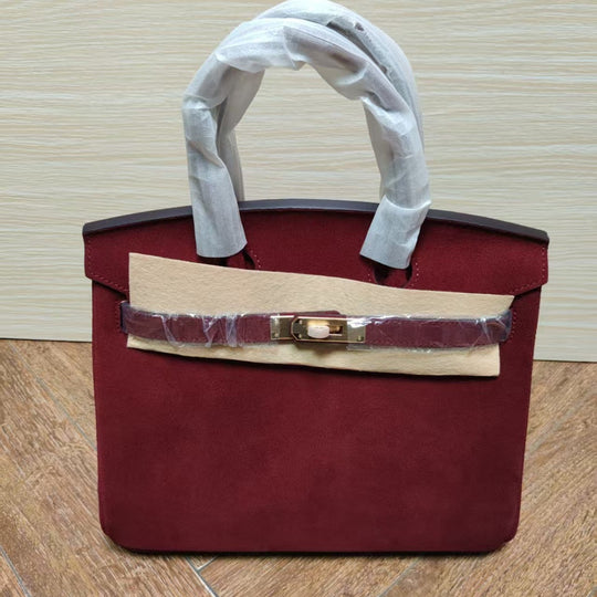 Damen Handtasche aus feinstem Wildleder mit goldfarbenem Verschluss Nord Taschen