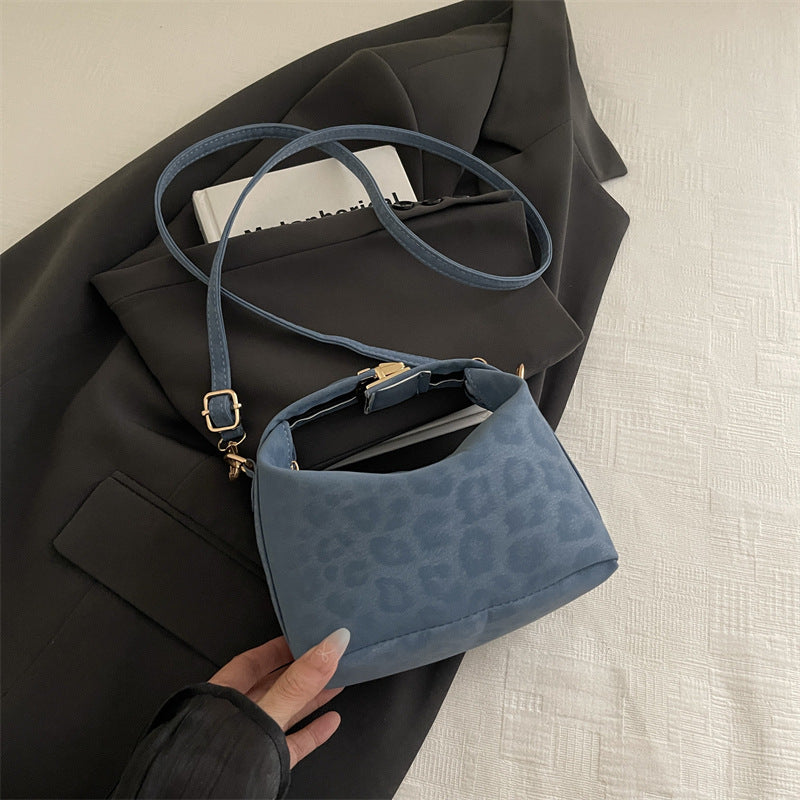 Damentasche mit elegantem Leopardenmuster und wertvollen Details Nord Taschen