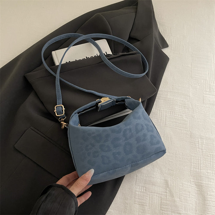 Damentasche mit elegantem Leopardenmuster und wertvollen Details Nord Taschen