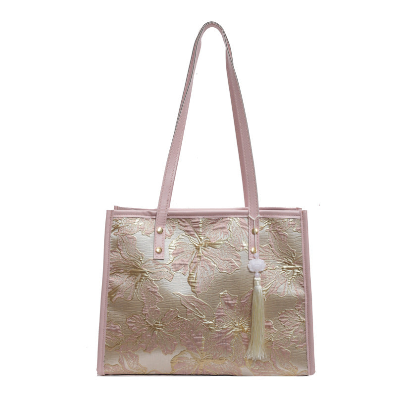 Damen Tragetasche mit floralem Stickdesign und elegantem Quastenanhänger Nord Taschen