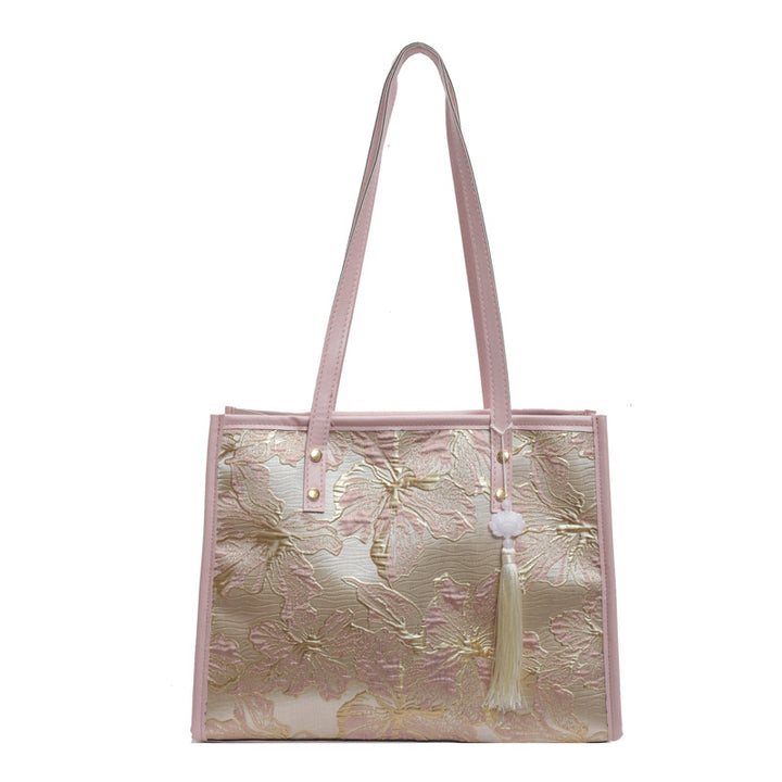 Damen Tragetasche mit floralem Stickdesign und elegantem Quastenanhänger Nord Taschen