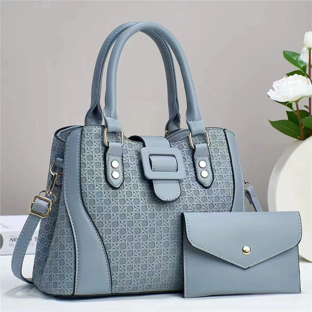 Damen modische Handtasche mit anspruchsvollem Reliefdesign und abnehmbarer Clutch Nord Taschen